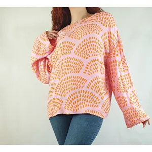 Bright pink pre-owned long sleeve top with orange print size SM (fits sizes 10-12)