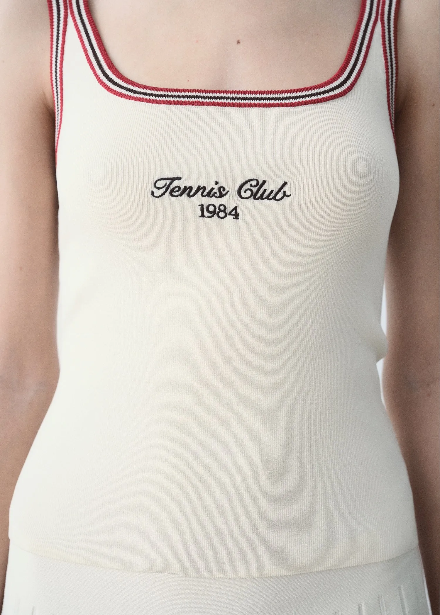 Top embroidered message contrast trim