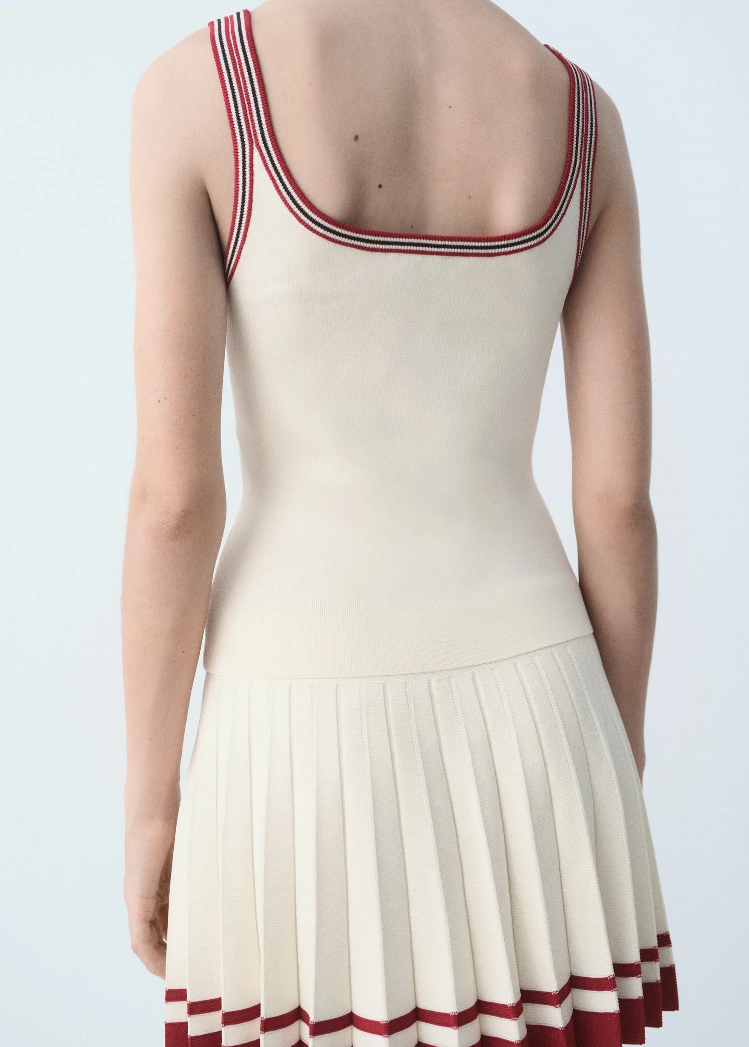 Top embroidered message contrast trim