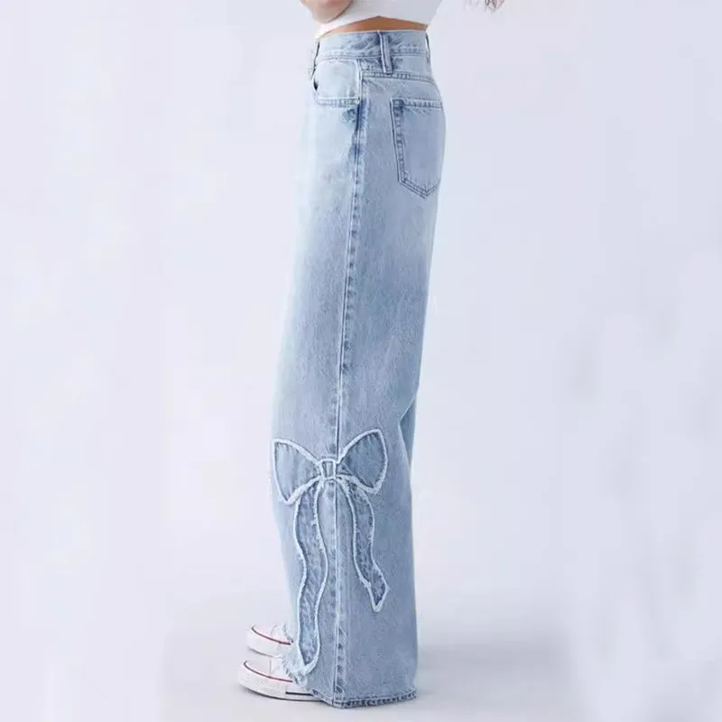 Wiga Denim Trousers featuring Bow Embroidery